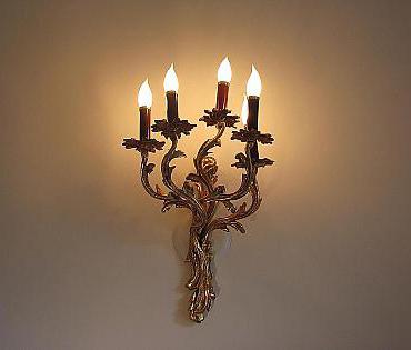 candelabro da muro in bronzo